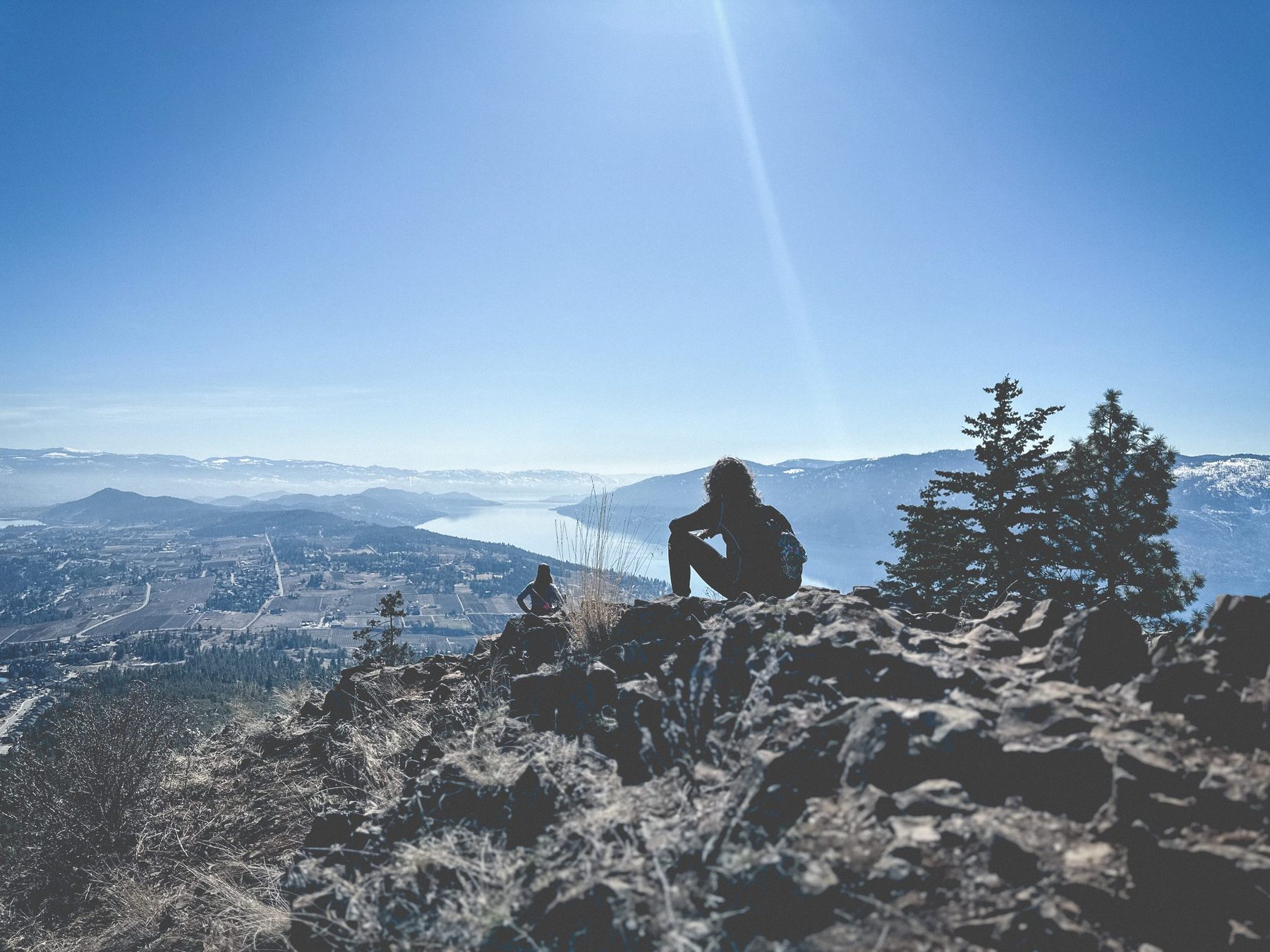 Looking out over Okanagan Lake from a rocky ridge